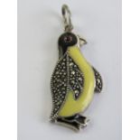 A 925 silver marcasite and enamel pendant in the form of a penguin, 3.5cm in length inc bale.