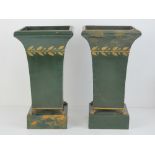 A pair of contemporary planters standing 31.5cm high.