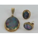 To match above Lot; An opal doublet pendant with matching stud earrings.