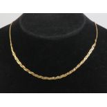 A 9ct gold part-plaited 's' link chain necklace, hallmarked 375 and measuring 41.5cm in length.