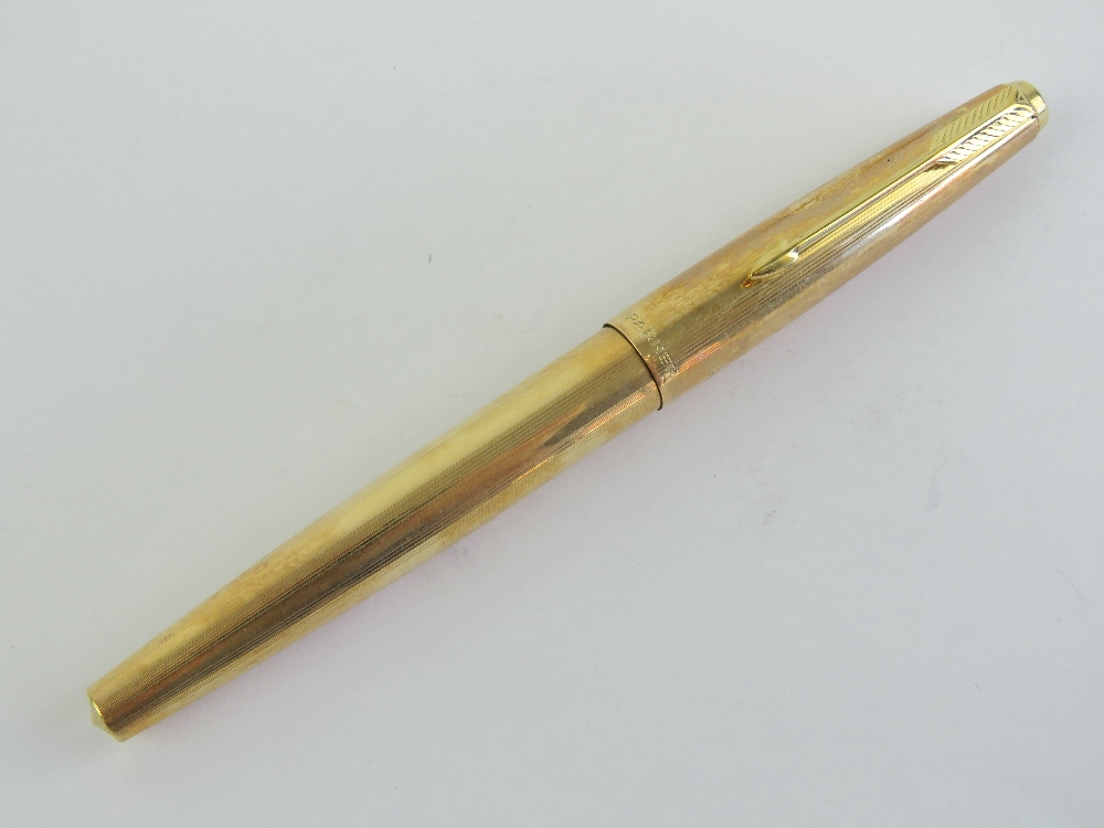 A Parker fountain pen having 14ct gold nib, 12ct rolled gold case and lid.
