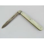 A hallmarked silver fruit knife having mother of pearl handle, hallmarked Sheffield 1895.