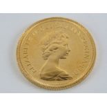 A Royal Mint 22ct gold full sovereign, Elizabeth II 1979, 8g. In original presentation packaging.