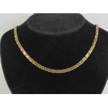 A 9ct gold 'S' link chain necklace measuring 42.5cm in length, hallmarked 375 and weighing 17.5g.