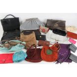 A quantity of assorted vintage and contemporary ladies handbags including 1970s suede examples,