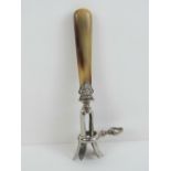 A late 19th / early 20th century French silver plate and horn manche a gigot (ham bone holder) with