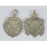 Two HM silver fob medallions, one of shield form and one with football player to front,