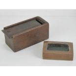 A handmade and glazed smokers receptacle in the form of a recessed brick, 8cm in length.