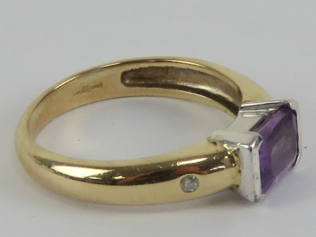 A 9ct gold Amethyst and diamond ring, the central emerald cut amethyst approx 0. - Image 2 of 2
