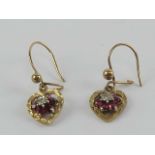 A pair of 9ct gold diamond and ruby heart shaped earrings, hallmarked 375 to hanger, 2.