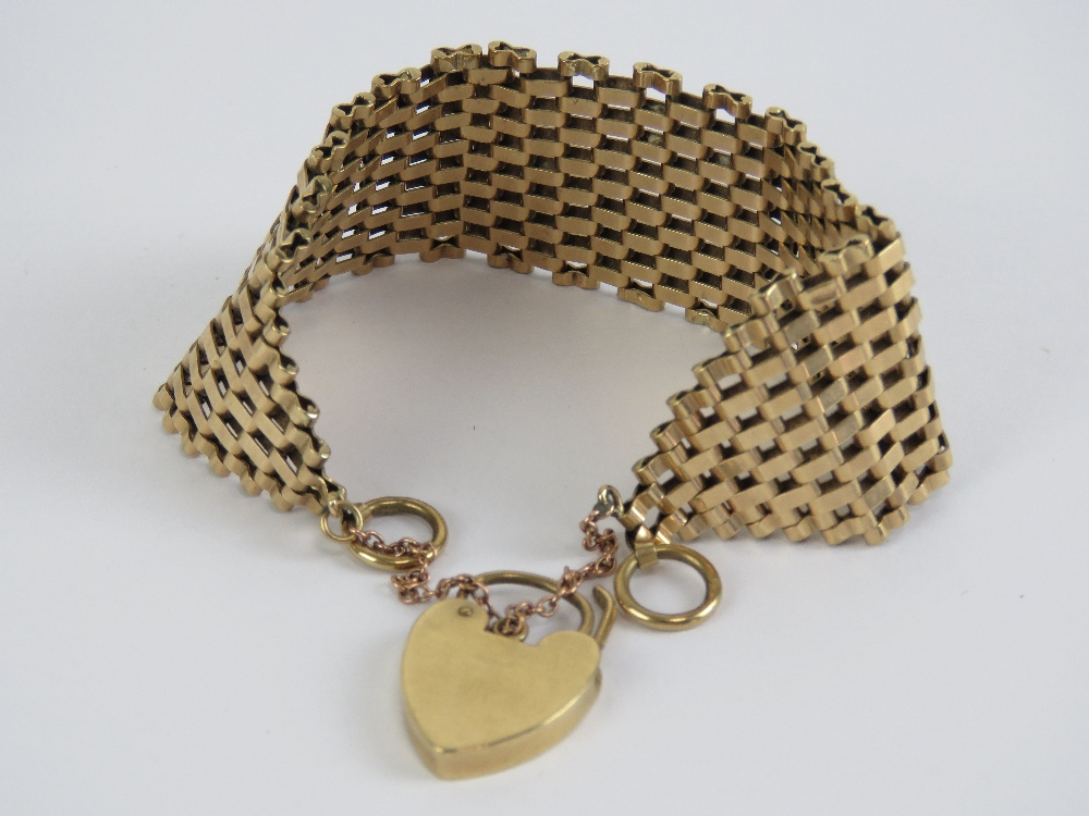 A 9ct gold eight row articulated bracelet having heart padlock clasp, - Image 4 of 4