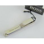 An as new Hugo Boss tie clip in box with label, RRP £59.