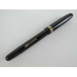 A Watermans 'Self filler' fountain pen having Watermans 14ct gold nib.