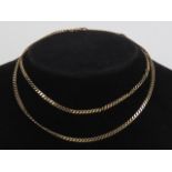 A 9ct gold flattened curb link chain necklace, 72cm in length, stamped 9k, 11.3g.