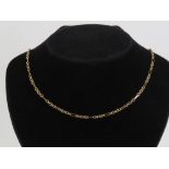 A Russian 9ct gold alternating link necklace having partial Russian hallmark and full London 375