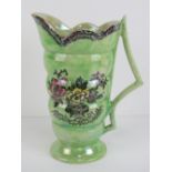 A green lustre Astoria pattern jug made by Arthur Wood Royal Bradwell Works,