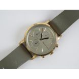 DKNY; a 'rose gold' stainless steel wristwatch having grey dial and leather strap, 11504 NY-2338,