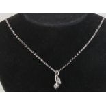 A silver Links of London charm in the form of a shoe, on a sterling 925 silver chain,