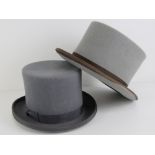 Two grey felt top hats; one hand made by Christys London, the other being Youngs Formalwear.