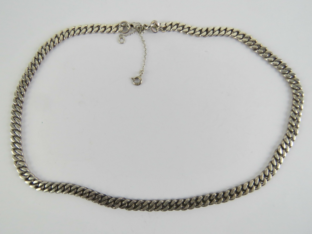 A heavy silver flattened curb link chain necklace complete with safety chain, - Image 2 of 3