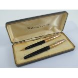 A box set Waterman's fountain pen having 14ct gold nib together with matching propelling pencil