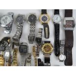 A large quantity of assorted men's and ladies wristwatches.