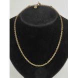 A 9ct gold chain necklace having T-bar clasp with heart pendant upon, hallmarked 375,