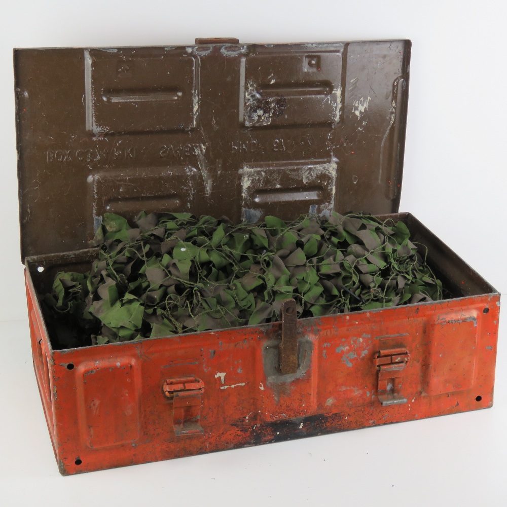 A large ammo box containing a quantity o