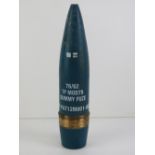 An inert 76mm British practice shell hea