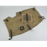 A MG34 breech cover and 'asbestos' heat proof mitt.