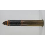 An inert WWI Canadian military 18lb projectile,