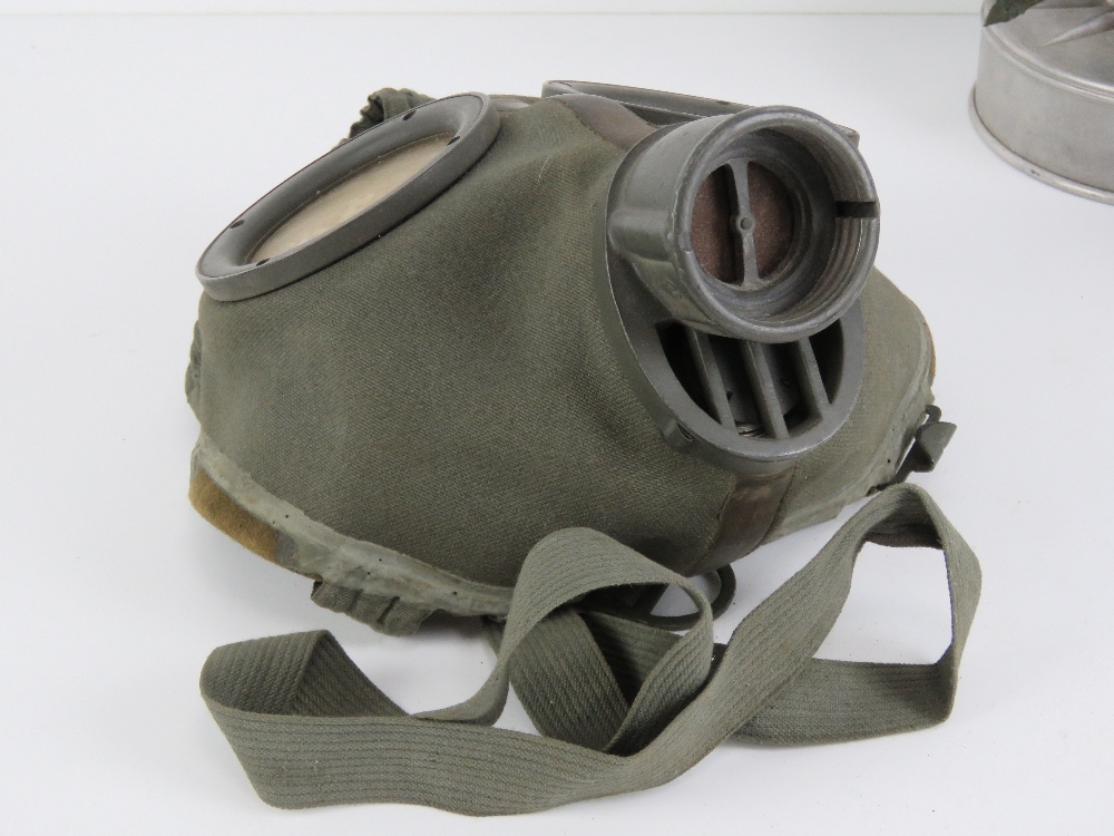 A WWII German Air Defence gas mask with filter, together with a civilian gas mask with filter. - Image 3 of 7