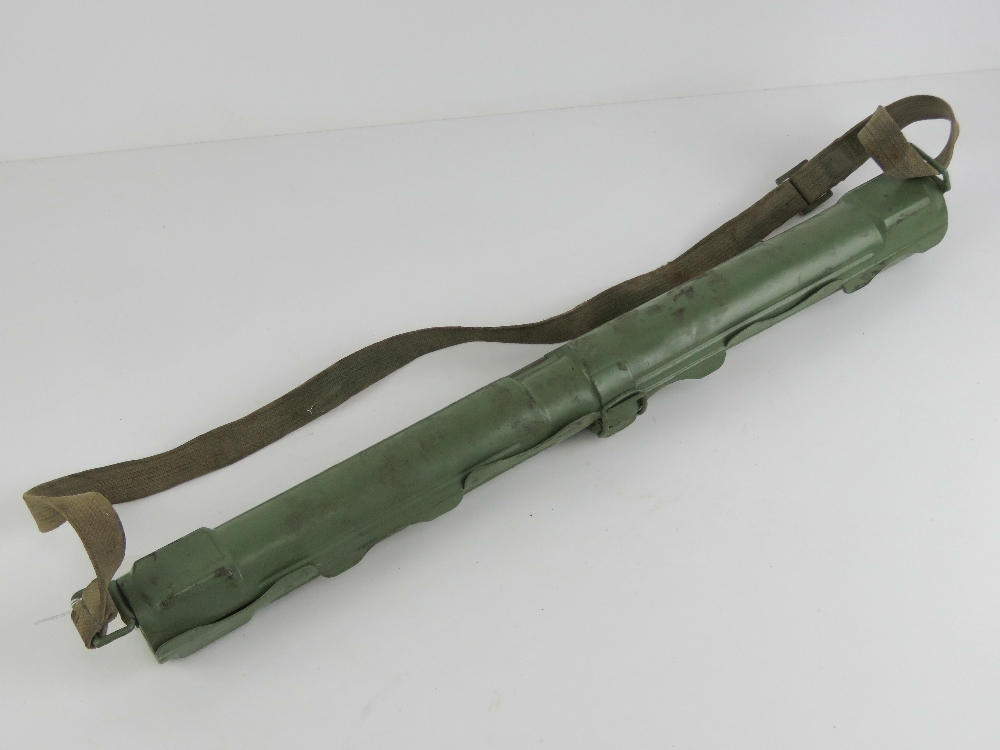A MG42 spare barrel case, dated 1943 and marked LAUF SCHUTZER 42, with carry strap.