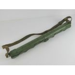 A MG42 spare barrel case, dated 1943 and marked LAUF SCHUTZER 42, with carry strap.