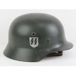 A reproduction WWII German SS M42 single decal helmet, having liner and chin strap,