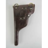 A reproduction Mauser 'broom handle' leather holster, dated 1915.