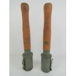 Two inert German stick grenades.