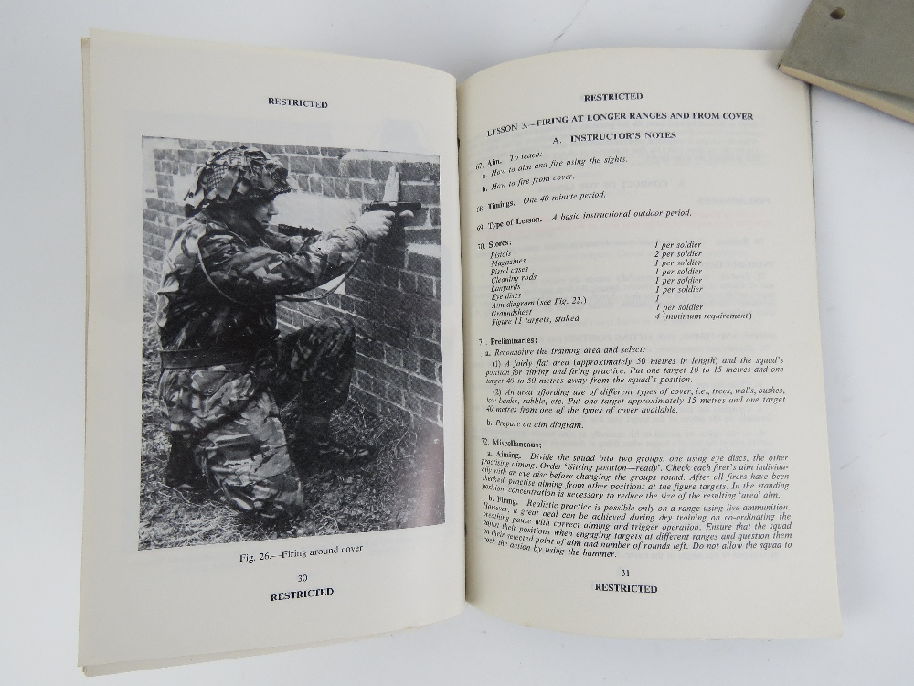 A British Browning pistol training book together with an Infantry mortar training book. Two items. - Image 4 of 6