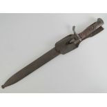 A WWI German Mauser bayonet with frog.