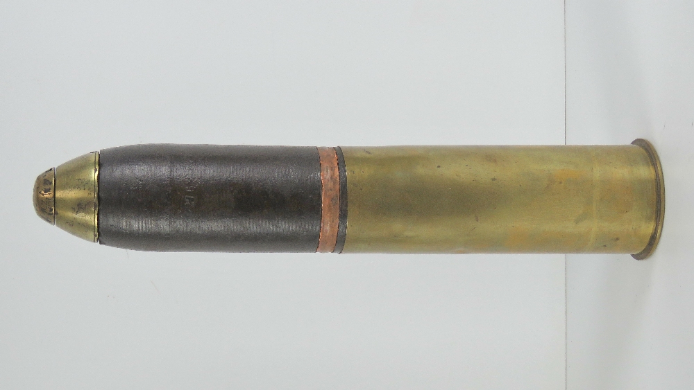 An inert WWI Dusseldorf 7.5cm Sp61 shell, dated 1917.