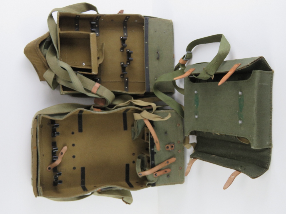 A Soviet military Cold War RPG-2 and RP-7 rocket launcher back pack with straps.
