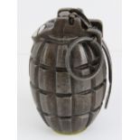 An inert Mills No5 Mk1 grenade, dated 1916, C.A.V.