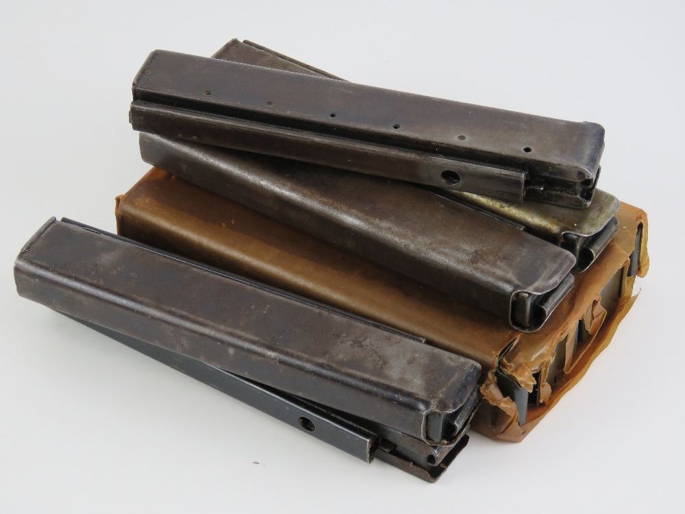 Ten WWII US 30 round Thompson stick magazines.