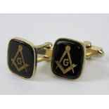 Masonic; pair of carved black onyx cufflinks having square and compass design upon.