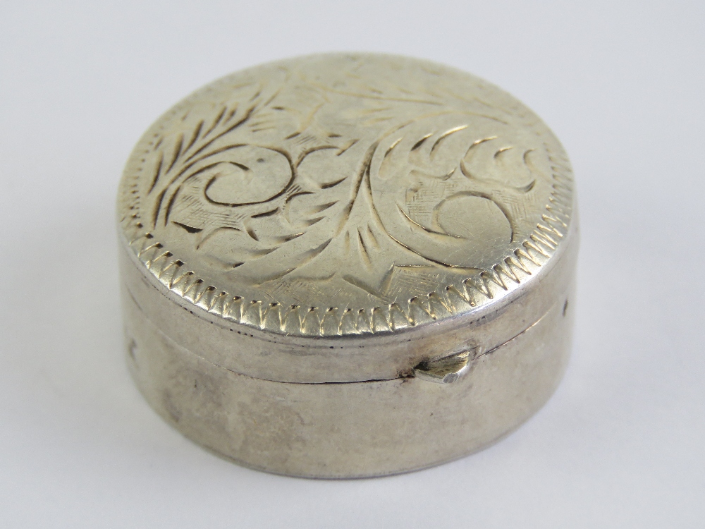 A 925 silver pill pot, hinged lid having