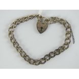 A HM silver charm bracelet having heart