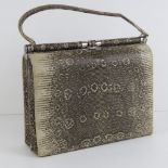 A vintage snake skin ladies handbag comp