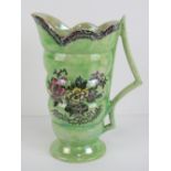 A green lustre Astoria pattern jug made