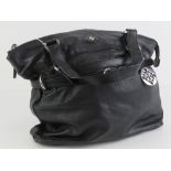 A black leather Patrick Cox tote handbag