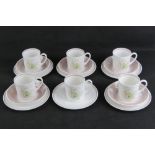 A set of five Susie Cooper trios each in